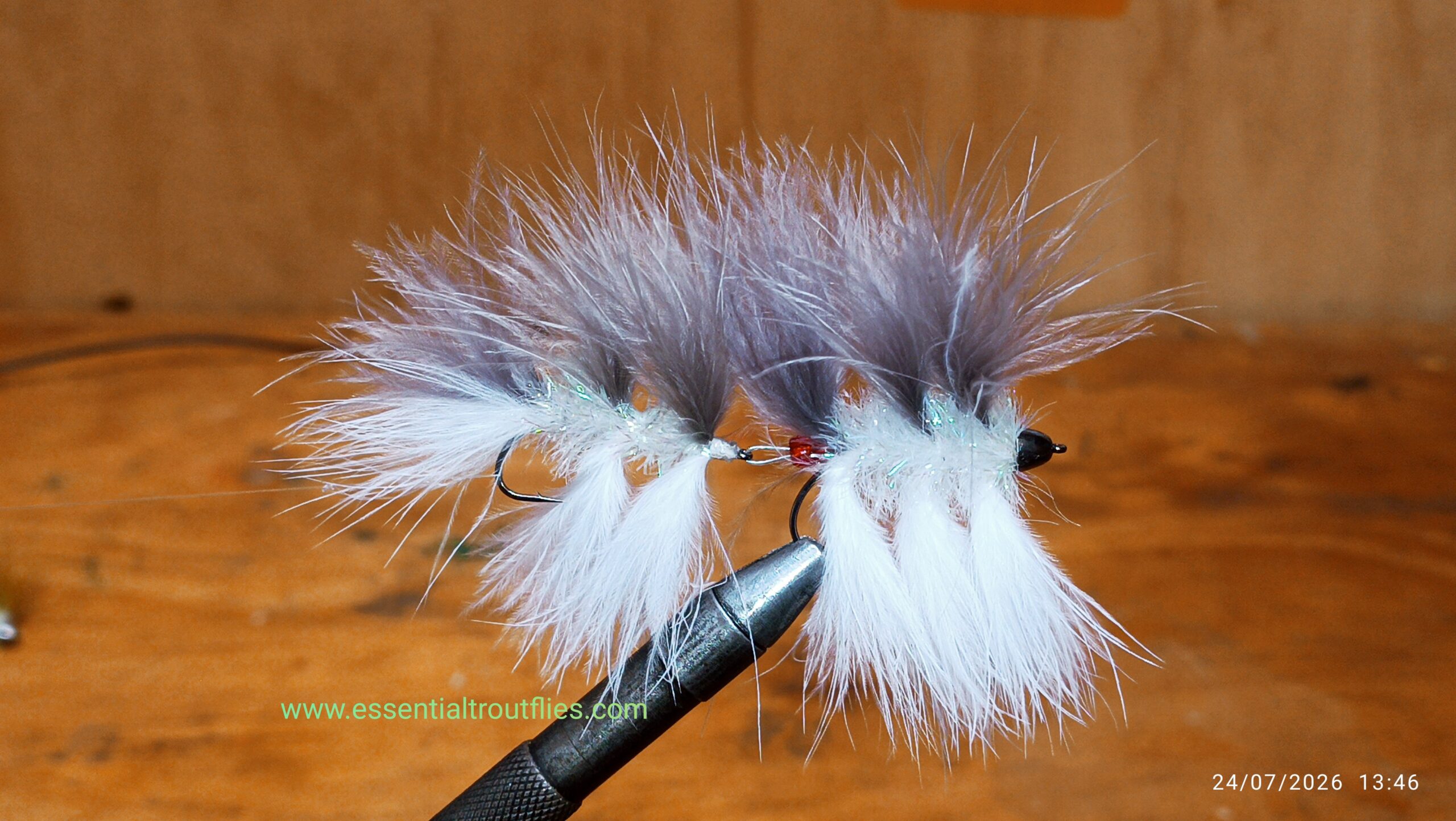 IMG_20260724_155832 ARTICULATED BARELY LEGAL WHITE & GREY STREAMER FLY ( FOR 12 PIECES) - Image 1